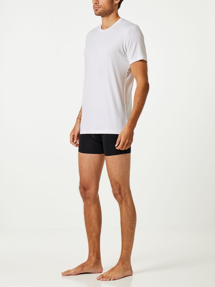 T-SKJORTE HVIT 7237605_100_Tufte_Noos_modell-left_T-SKJORTE HVIT 100.jpg_Left||Left