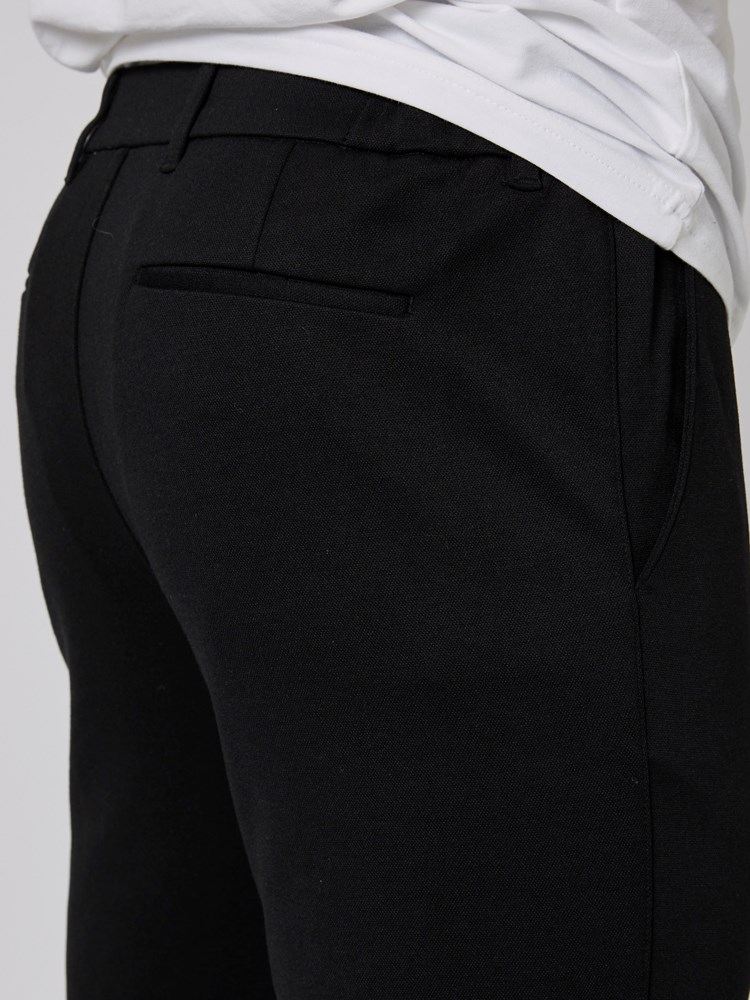 Jogge bukse 7500716_CAE-WOSNOTWOS-A22-Modell-Front_chn=boys_5012_Jogge bukse CAE.jpg_Front||Front