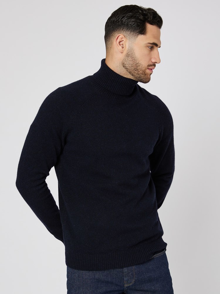 Sigurd polo strikkegenser 7505260_R15-MRCAPUCHIN-W23-Modell-Front_chn=boys_2116_Sigurd polo strikkegenser R15.jpg_Front||Front
