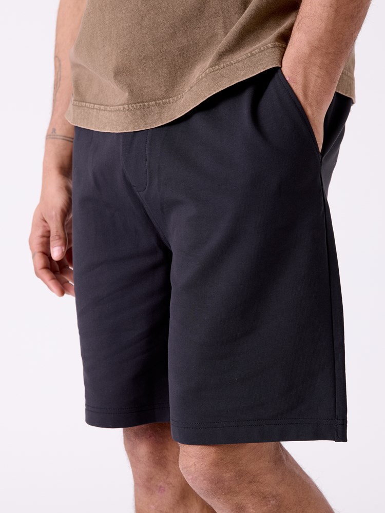 Mjuk shorts 7515018_C18-WOSNOTWOS-H26-Modell-Front_chn=decades_973_Mjuk shorts C18.jpg_Front||Front