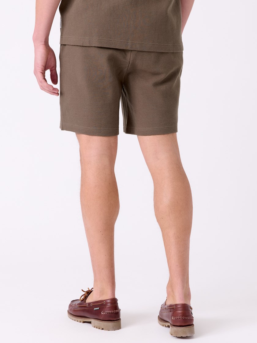 7515242 AII 7515242_AII-MRCAPUCHIN-H26-Modell-Front_chn=decades_5886_Isak shorts AII.jpg_Front