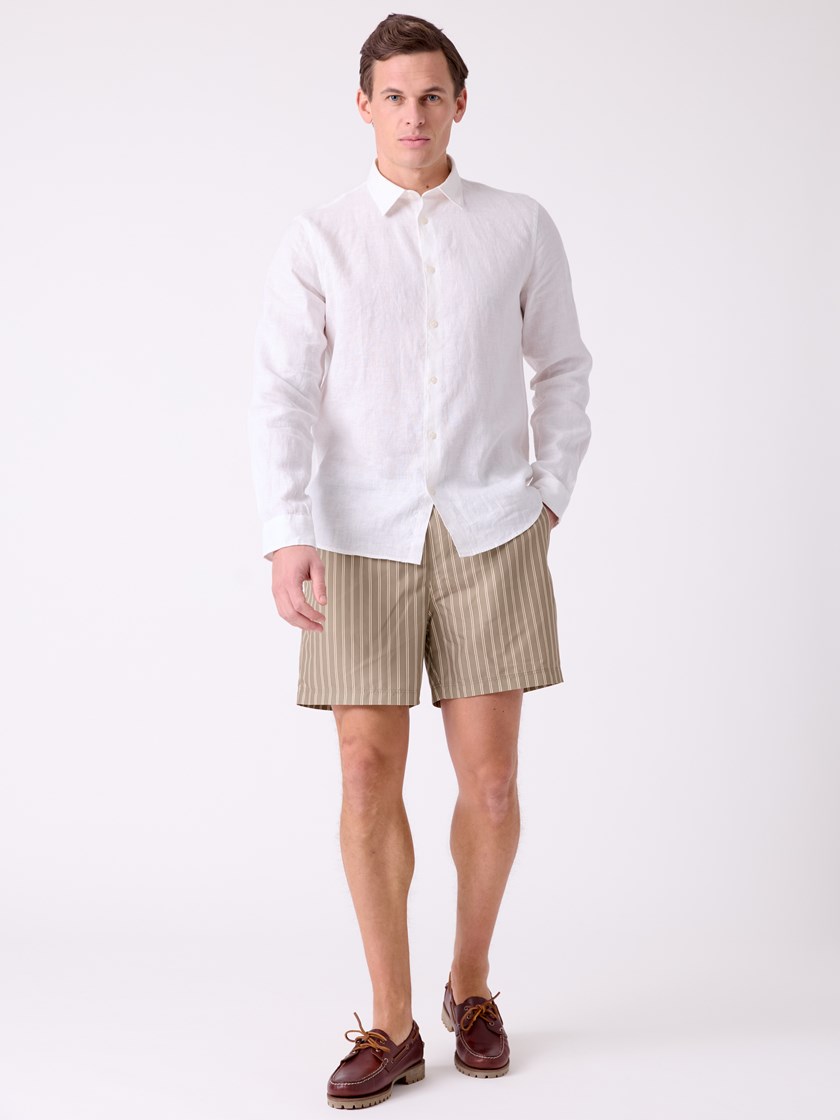 7515282 T09 7515282_T09-MRCAPUCHIN-H26-Modell-Front_chn=decades_5816_Strand badeshorts T09.jpg_Front